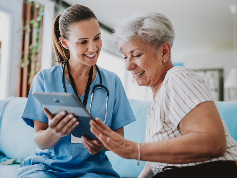 nurse reviewing information with patient