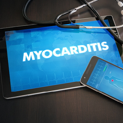 Tablet with the word MYOCARDITIS on it with a blue background and a stethoscope laying on top